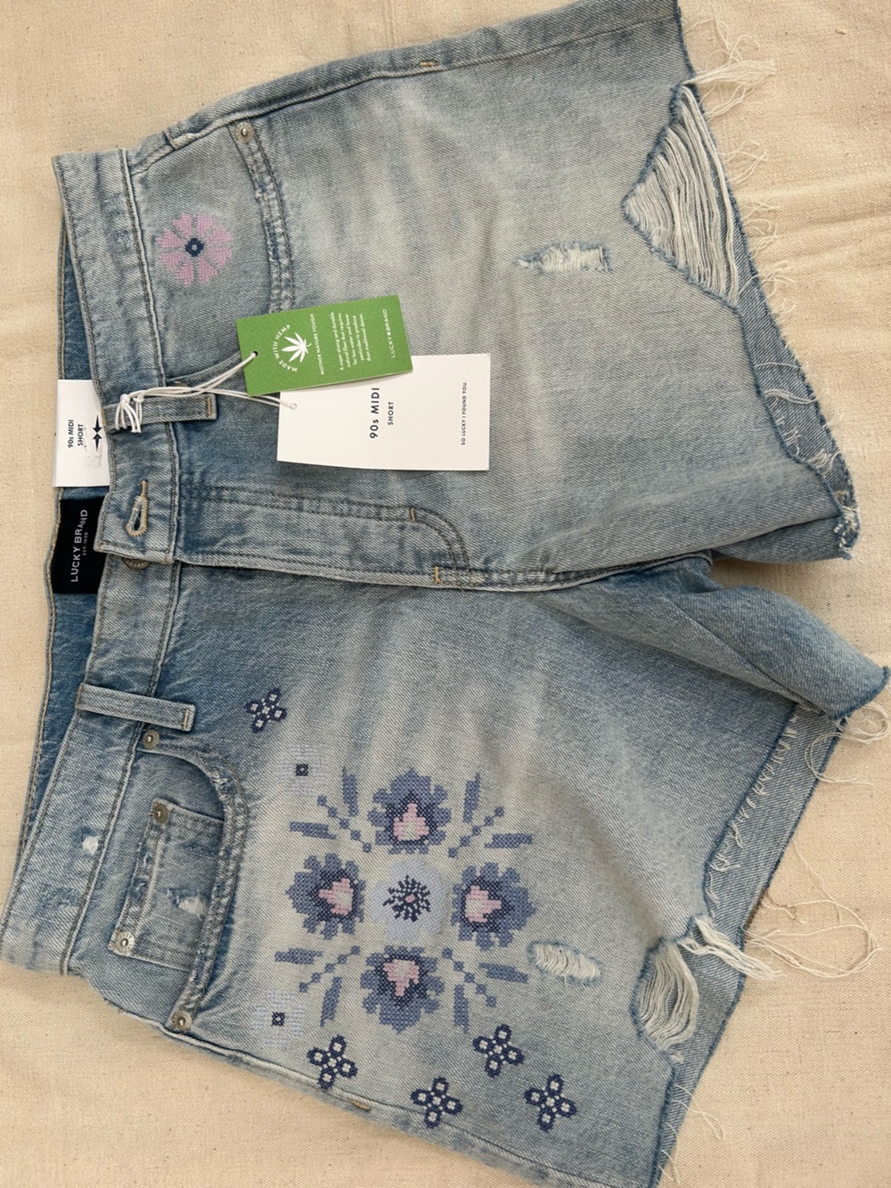 Lucky Brand Faded Blue Denim Shorts w/Floral Embroidery, 8s. Priced @ 79.50 NWTs